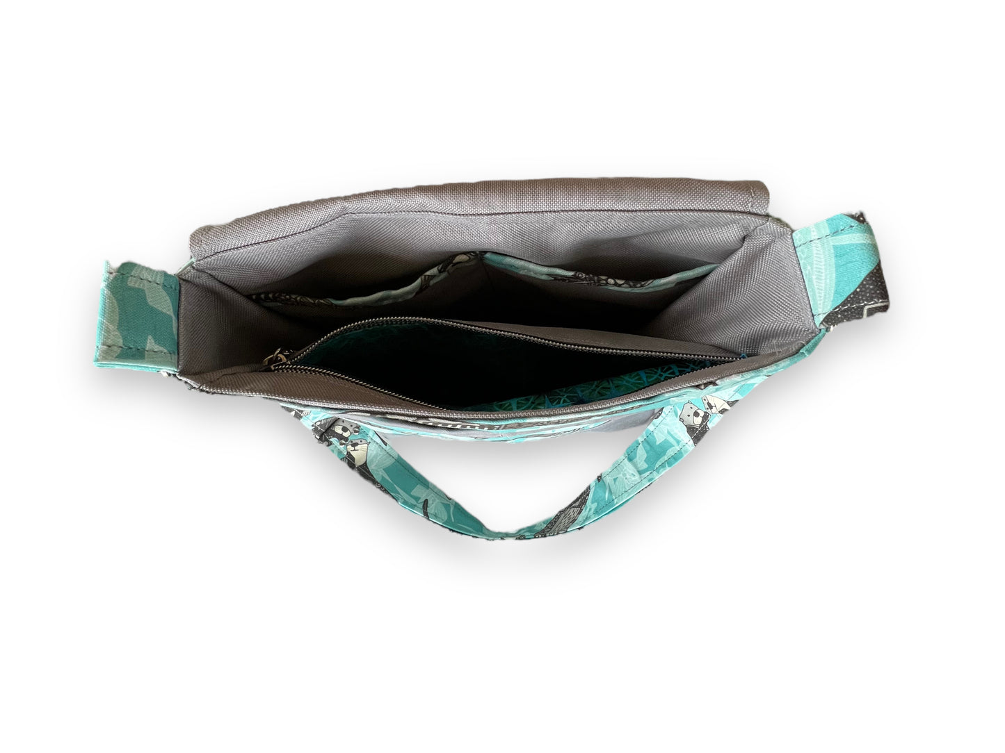 Otter crossbody bag with waxed canvas base and waterproof lining.