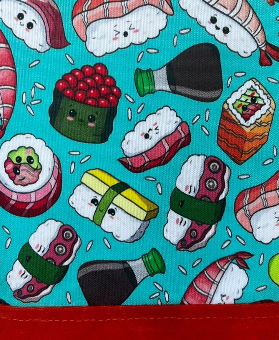 Kawaii sushi crossbody bag built for a day on the town! It has an adjustable strap, two pockets, main compartment and magnetic closure.
