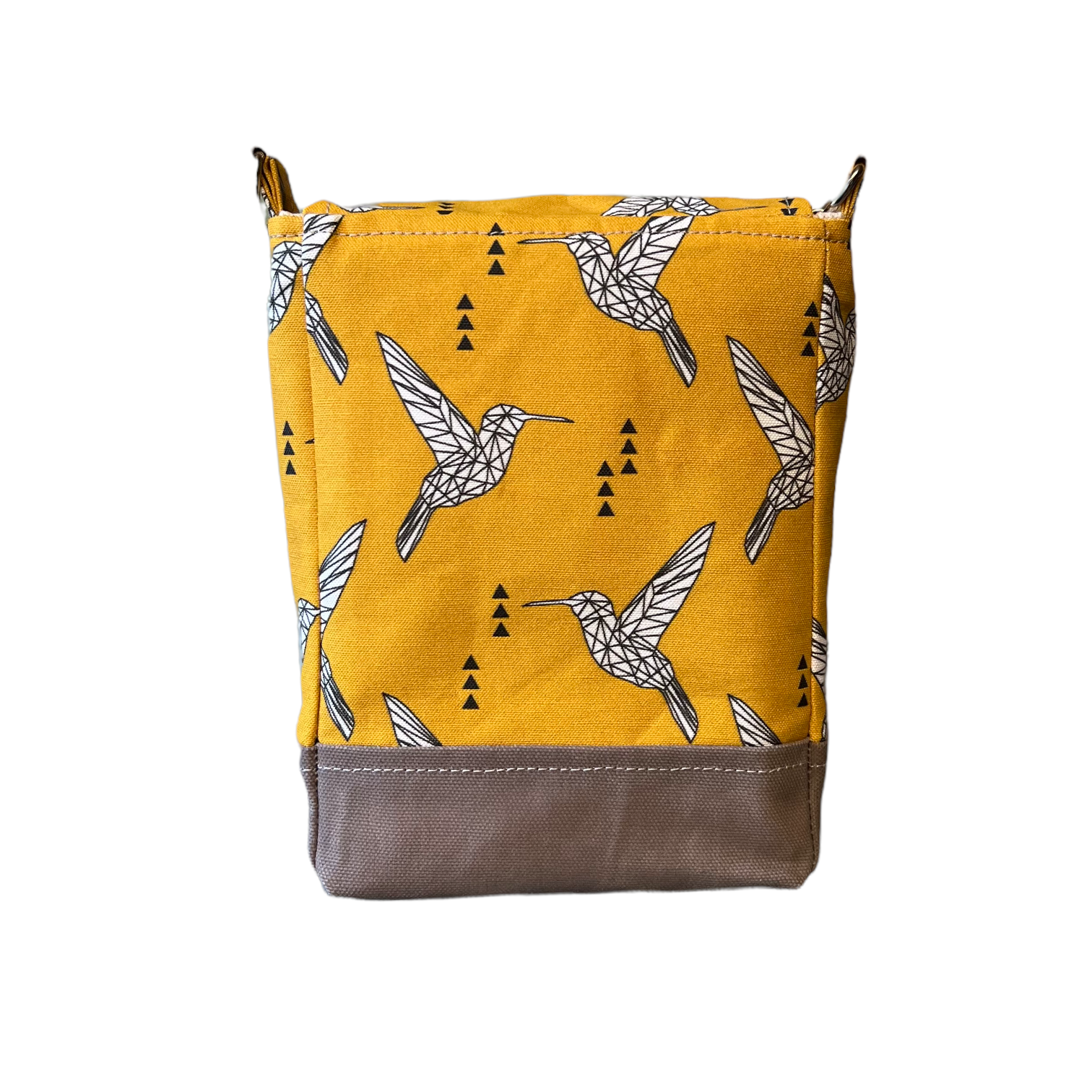 Back of yellow purse with bird