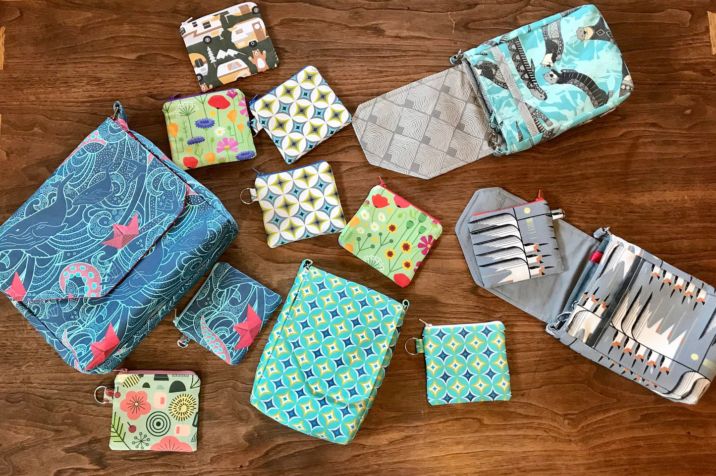 Mid-century modern geometric print crossbody bag, mini messenger style, teal, navy, & yellow, 8.5"x6".