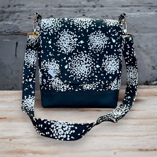 Stay Organized and Chic with our Black Polka Dot Canvas Crossbody Bag