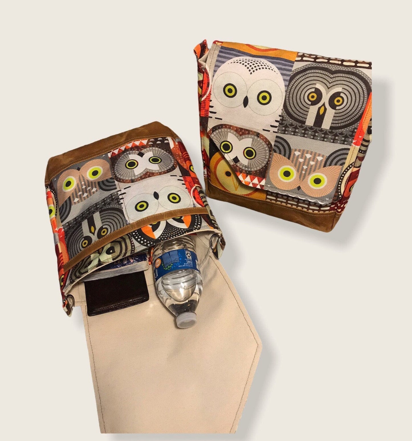 Owl print bag made of artisan fabric and hand waxed canvas! Adjustable strap, five pockets & roomy interior, magnetic flap closure.
