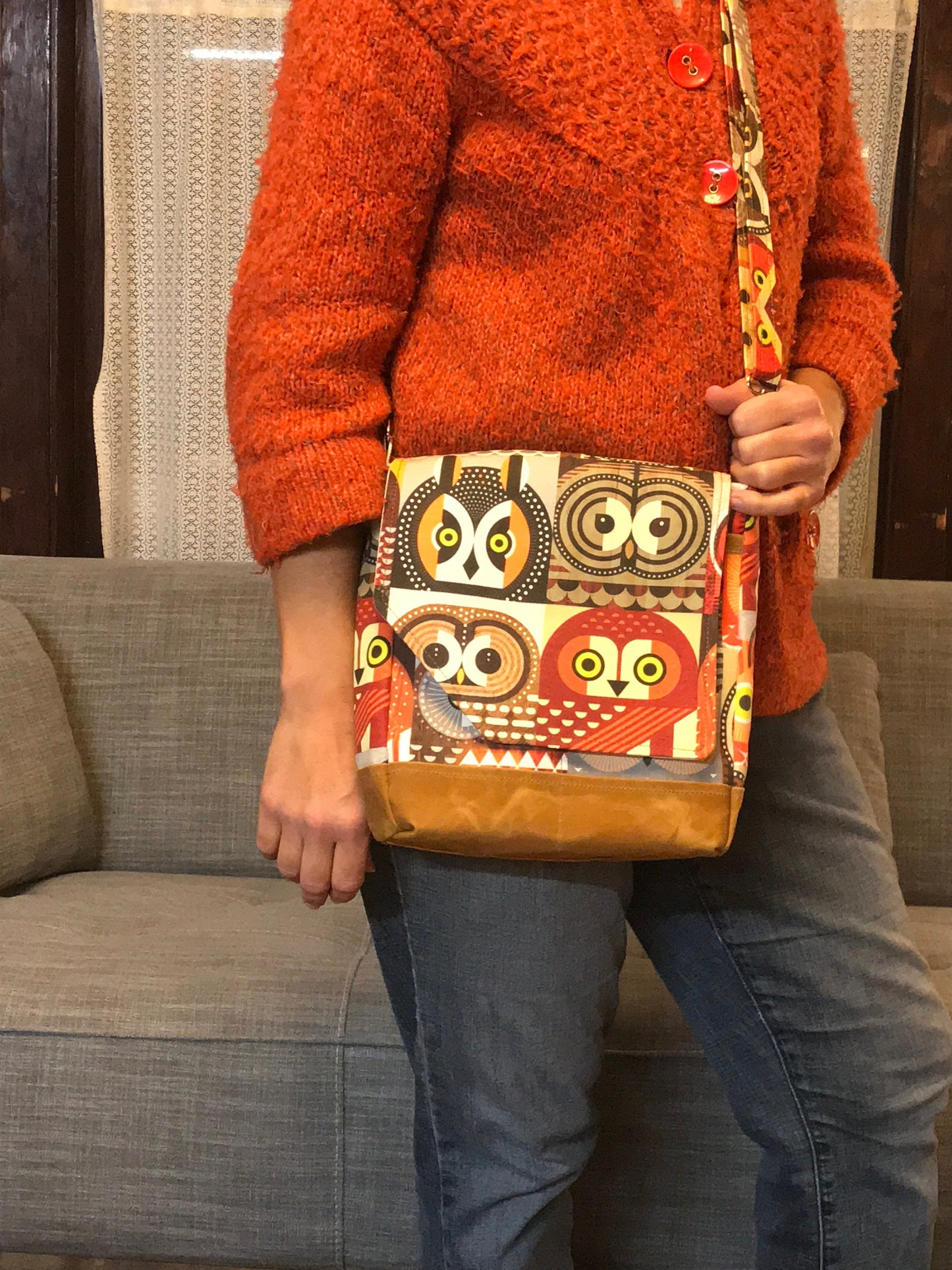 Owl print bag made of artisan fabric and hand waxed canvas! Adjustable strap, five pockets & roomy interior, magnetic flap closure.