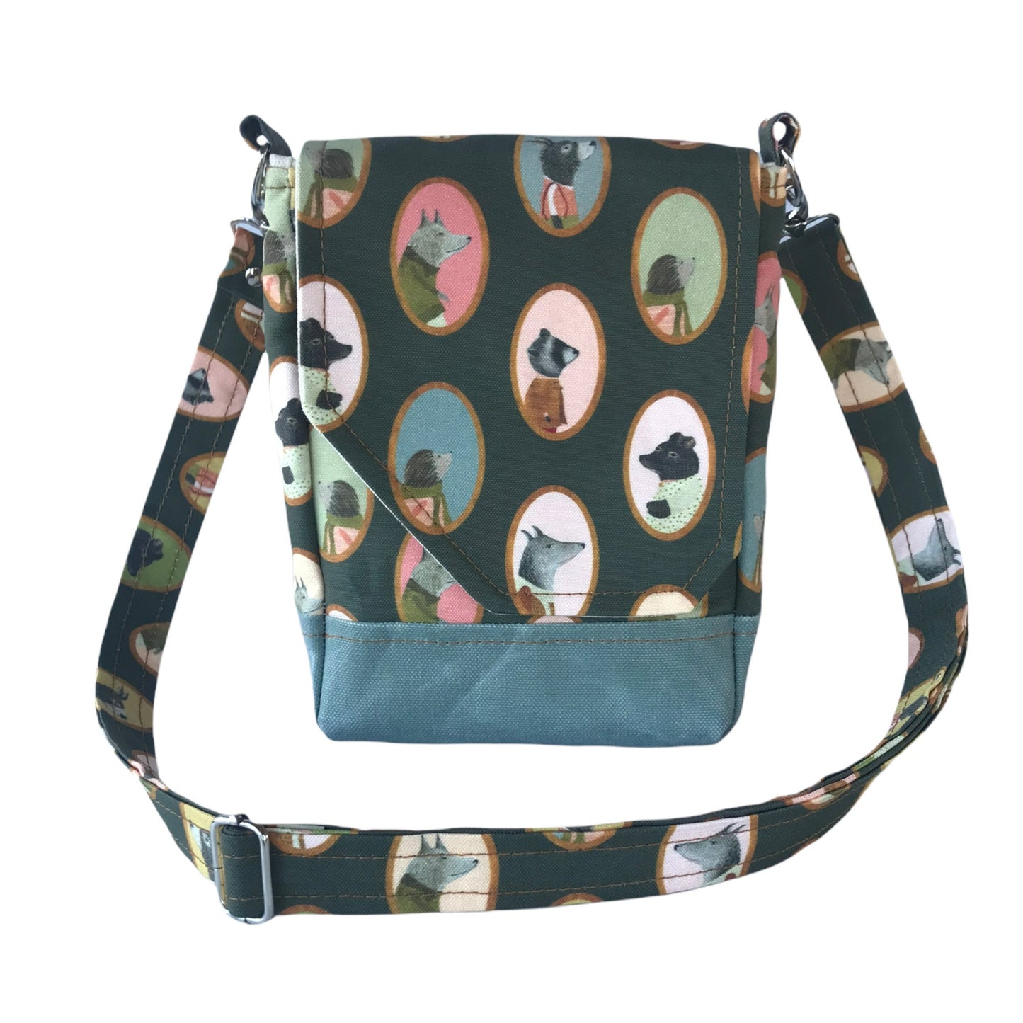 Cameo animal print crossbody bag that will hold your essential items. It has an adjustable strap, two pockets + main compartment
